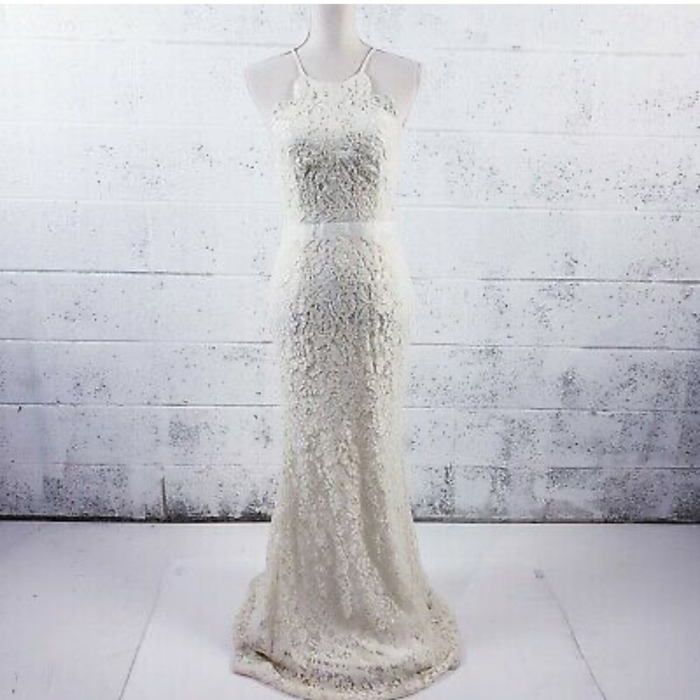Cream lace wedding/formal dress. Never worn and new with tags.